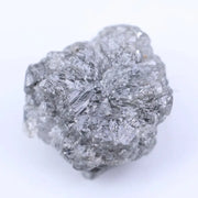 Natural raw diamond with organic shape and textures, showcasing earthy elegance and charm.