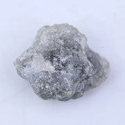 Raw diamond stone with natural crystalline patterns and authentic unpolished charm.