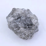 Natural uncut raw diamond crystal with rough texture and natural shine, ideal for collectors and custom jewelry