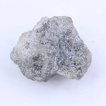 Loose uncut diamond stone in natural rough form showing original crystal surface and natural brilliance