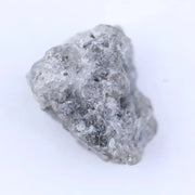 Uncut diamond crystal showing natural octahedral structure and raw gemstone brilliance