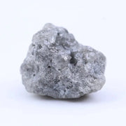 Uncut diamond crystal showing natural octahedral structure and raw gemstone brilliance