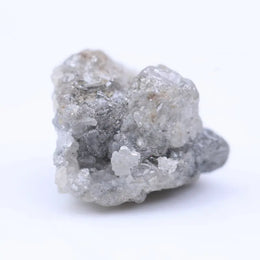Natural rough diamond stone with original crystal edges and untreated raw gemstone appearance