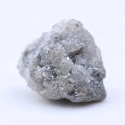 Natural rough diamond stone with original crystal edges and untreated raw gemstone appearance