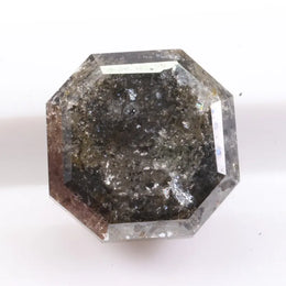 Authentic natural diamond crystal photographed to show natural inclusions and growth patterns. This image educates buyers on how to tell natural diamonds from lab grown diamonds
