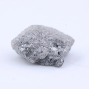 Loose natural raw diamond stone with uneven crystal structure and organic surface texture
