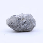 Loose natural raw diamond stone with uneven crystal structure and organic surface texture