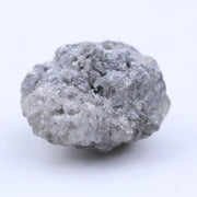 Natural rough diamond for cutting and polishing showing original gemstone formation pattern