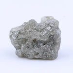 Raw diamond crystal close-up showing natural inclusions and original uncut gemstone structure