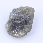 Uncut natural diamond stone with strong crystal edges and raw sparkle in natural light