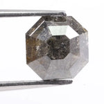 Authentic natural diamond crystal photographed to show natural inclusions and growth patterns. This image educates buyers on how to tell natural diamonds from lab grown diamonds