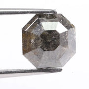 Authentic natural diamond crystal photographed to show natural inclusions and growth patterns. This image educates buyers on how to tell natural diamonds from lab grown diamonds