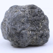 Close-up of gray diamond gemstone showing natural tone and sparkle
