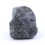 natural raw gemstones and raw diamond crystal collection grey black rough diamond 