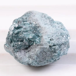 Icy grey diamond gemstone ring with natural inclusions and elegant modern setting