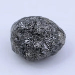 uncut raw diamond ring and raw gemstone collection black grey  rough diamond 