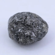 uncut raw diamond ring and raw gemstone collection black grey  rough diamond 