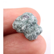 Blue rough diamond in natural uncut form featuring irregular diamond structure and raw texture. This loose diamond stone is ideal for fine jewelry designers, gemstone collectors, and those searching for natural diamond material for unique ring creations.