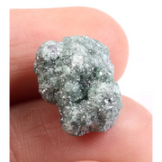 Blue rough diamond in natural uncut form featuring irregular diamond structure and raw texture. This loose diamond stone is ideal for fine jewelry designers, gemstone collectors, and those searching for natural diamond material for unique ring creations.
