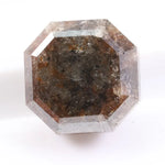 Natural diamond ring featuring uncut and polished elements, highlighting what colors diamonds come in naturally.