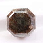 Natural diamond ring featuring uncut and polished elements, highlighting what colors diamonds come in naturally.