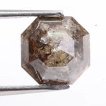 Natural diamond ring featuring uncut and polished elements, highlighting what colors diamonds come in naturally.