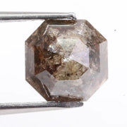 Natural diamond ring featuring uncut and polished elements, highlighting what colors diamonds come in naturally.