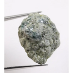 Green rough diamond displayed as a natural loose diamond with irregular diamond shape and raw crystal texture. This real natural diamond stone is uncut and untreated, making it ideal for custom diamond for ring designs, collectors, and buyers seeking authentic green rough diamond material.