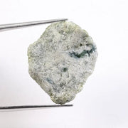 Green rough diamond displayed as a natural loose diamond with irregular diamond shape and raw crystal texture. This real natural diamond stone is uncut and untreated, making it ideal for custom diamond for ring designs, collectors, and buyers seeking authentic green rough diamond material.