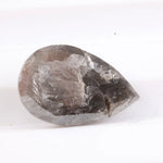 Pear cut natural diamond set in a real natural diamond ring, showcasing precision cutting and natural brilliance.