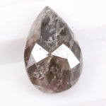 Pear cut natural diamond set in a real natural diamond ring, showcasing precision cutting and natural brilliance.