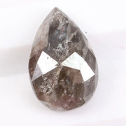 Pear cut natural diamond set in a real natural diamond ring, showcasing precision cutting and natural brilliance.