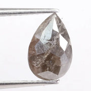 Pear cut natural diamond set in a real natural diamond ring, showcasing precision cutting and natural brilliance.