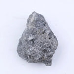 2.03 Ct grey rough diamond in its natural uncut form, highlighting authentic rare brilliance and raw organic texture.