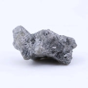 2.50 Ct grey rough diamond in its natural uncut state, showcasing earth-born raw beauty and rugged elegance.
