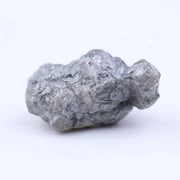 2.50 Ct grey rough diamond in its natural uncut state, showcasing earth-born raw beauty and rugged elegance.