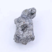 2.50 Ct grey rough diamond in its natural uncut state, showcasing earth-born raw beauty and rugged elegance.