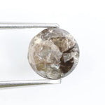 round cut natural diamond ring and round natural diamond grey-brown colored diamond 