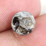 round cut natural diamond ring and round natural diamond grey-brown colored diamond 