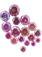 Collection of pink and purple diamonds on a white background
