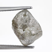 grey color loose natural rough diamond and 5.05 carat man made diamond