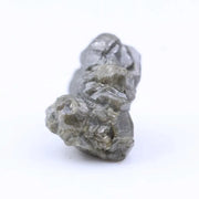 Natural grey diamond loose stone with raw texture and smoky charcoal tone for custom engagement ring design.