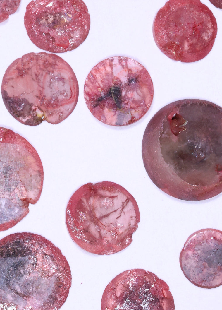 Pink raw diamond on a white background