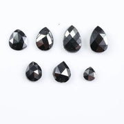 natural pear cut diamond black diamond what is a black diamond, diamond ring, how to tell if a diamond is real, lab grown vs natural diamond, raw diamonds, man made diamonds, GIA certified diamonds, buy loose diamonds.