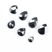 natural pear cut diamond black diamond what is a black diamond, diamond ring, how to tell if a diamond is real, lab grown vs natural diamond, raw diamonds, man made diamonds, GIA certified diamonds, buy loose diamonds.