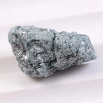 Rough raw diamond stone ideal for custom ring settings, showing differences between rough synthetic diamonds and natural raw diamond material.