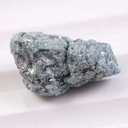 Rough raw diamond stone ideal for custom ring settings, showing differences between rough synthetic diamonds and natural raw diamond material.
