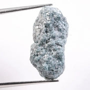 Rough raw diamond stone ideal for custom ring settings, showing differences between rough synthetic diamonds and natural raw diamond material.