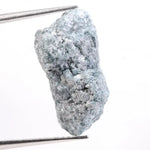 Rough raw diamond stone ideal for custom ring settings, showing differences between rough synthetic diamonds and natural raw diamond material.