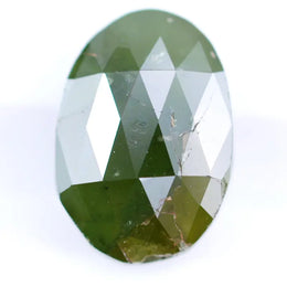 1.55 Ct natural olive green oval cut diamond loose gemstone with visible natural inclusions and faceted surface